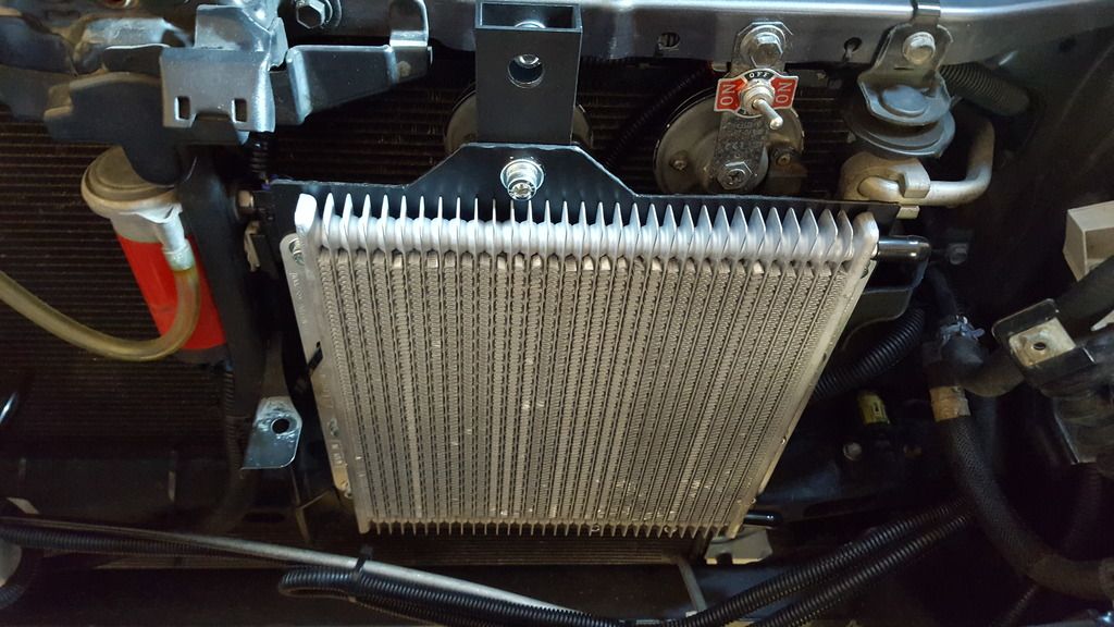 30 plate Davies Craig 679 transmission cooler install in Prado 120