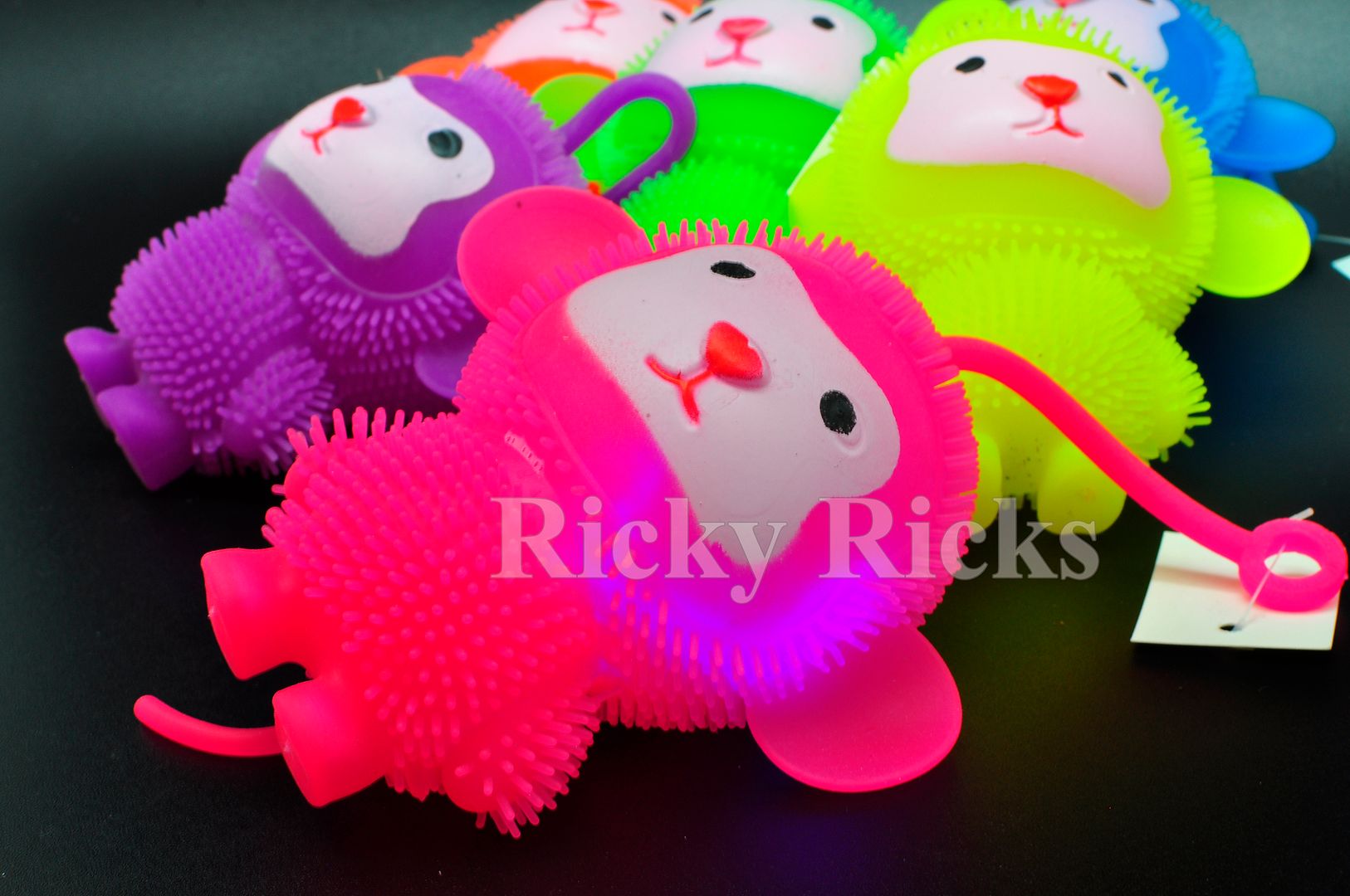 12 LightUp Puffer Balls YoYo Monkey Stretchy Elastic Flashing Rubber